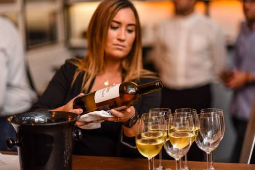 Sommelier Pouring White Bordeaux. (Image Provided by Bordeaux Wine Council)